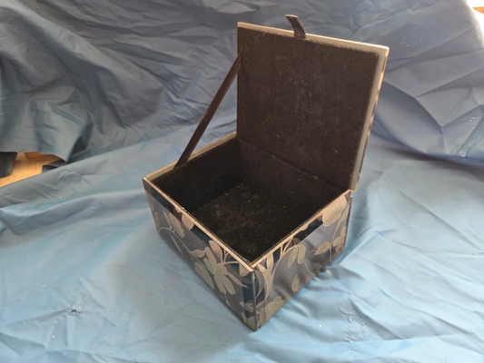 Vintage mirrored trinket box - open showing black velvet lining and leather pull tab
