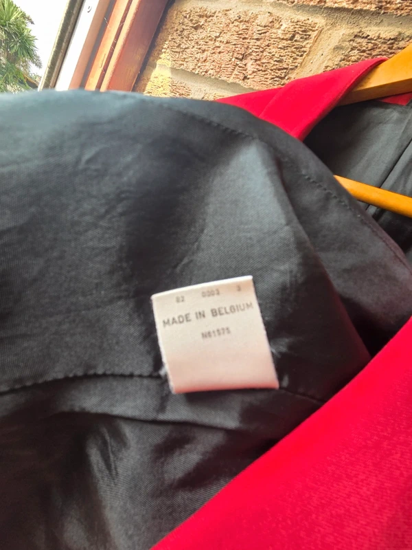 Antique-look button detail on cuff