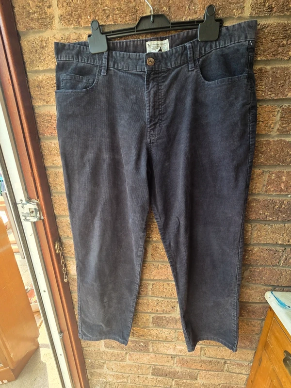 Tu Premium charcoal corduroy trousers - front view on hanger
