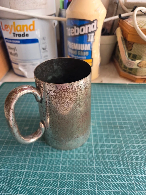Antique silver plated tankard - side view showing aged patina