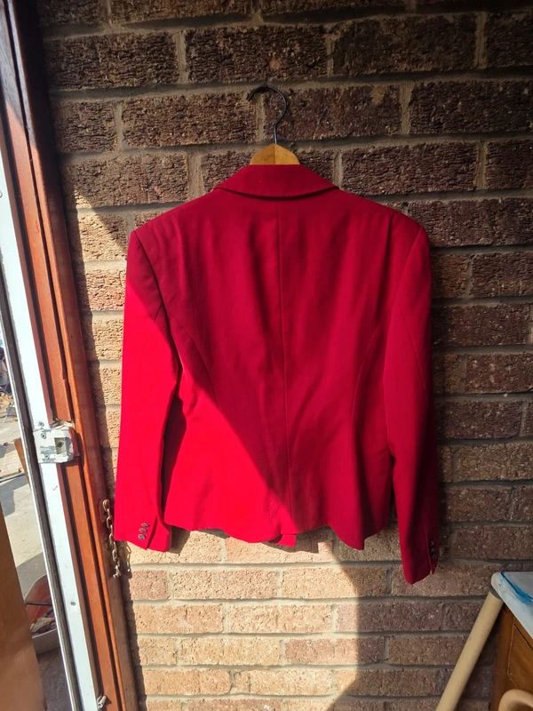 Small mark on front of blazer - condition detail