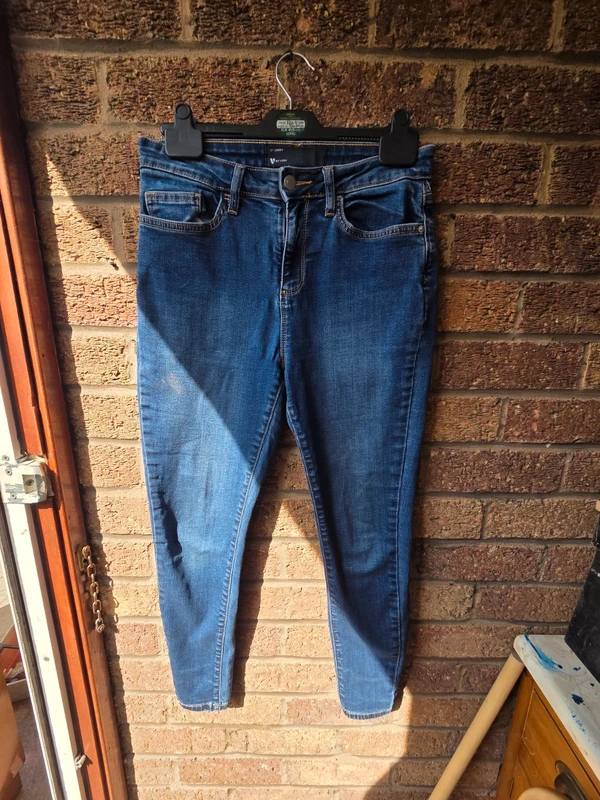 V by Very mid blue skinny jeans - front view on hanger