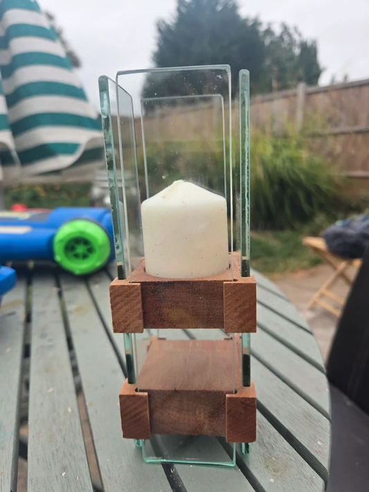 Glass and wood candle holder - side angle view showing architectural jointed wood corner blocks and glass panel construction