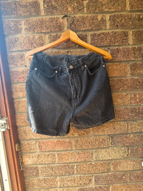 PrettyLittleThing washed black high waist mom denim shorts - front view